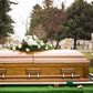 A casket during a burial