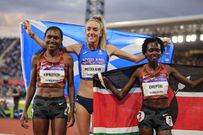 Sheila Chepkirui (L) poses for a photo with Eillish MCcolgan (C) and Irene Cheptai after a podium finish in the 10,000m at the 2022 Commonwealth Games.