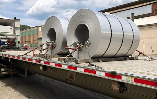 A trailer transporting steel coils