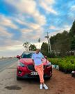 Felicity Shiru and her car