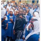 Nuru Okang'a with Mumias Muslim Primary School pupils