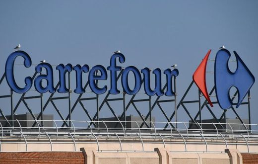 Carrefour has apologised for not closing a store in Brazil after an employee died, instead his body was covered with boxes and umbrellas and shopping continued