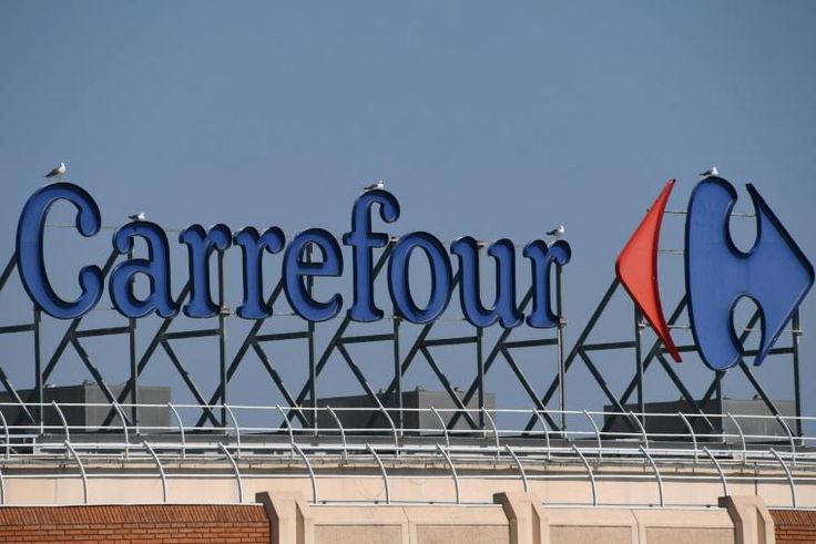 Carrefour has apologised for not closing a store in Brazil after an employee died, instead his body was covered with boxes and umbrellas and shopping continued