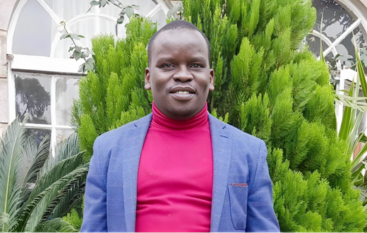 Joshua Arap Sang posing for a photo