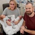 Rebecca Roberts, her husband and their babies [CNN]