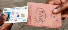 A photo of the old drivers license and the smart drivers license