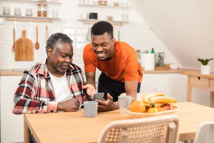 A man with his son having a convo