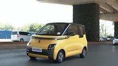 Kenyatta International Convention Centre(KICC) in a tiny electric car.