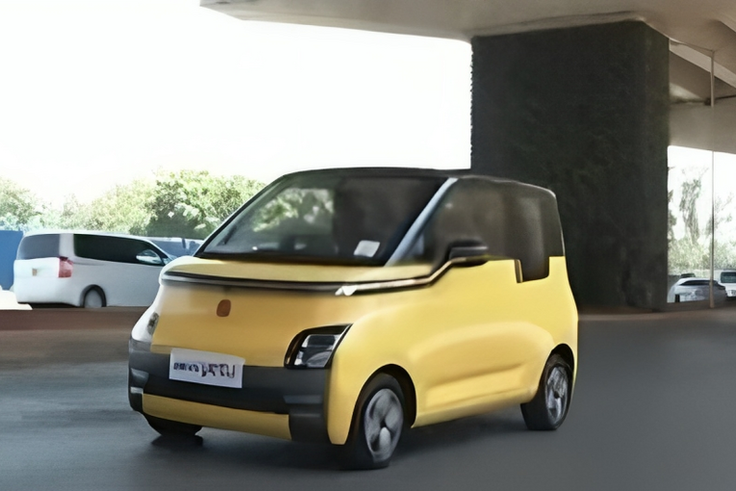 Kenyatta International Convention Centre(KICC) in a tiny electric car.