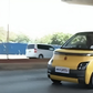 Kenyatta International Convention Centre(KICC) in a tiny electric car.