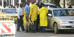 Nairobi County parking attendants interact with motorists