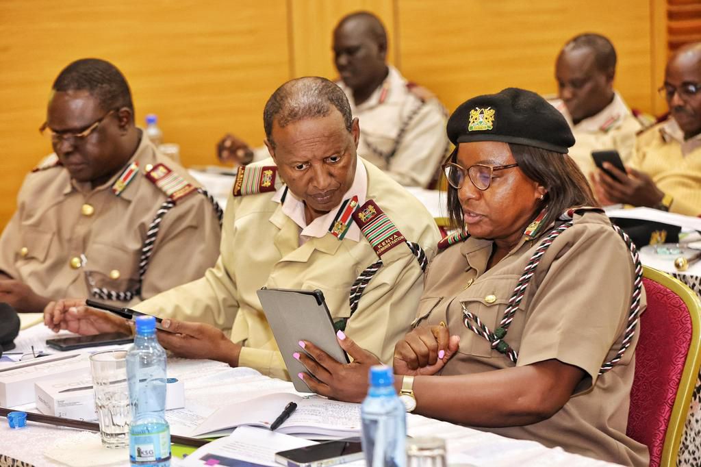 Interior PS Raymond Omollo issues tablets to regional and county commissioners at the Kenya School of Government,  Lower Kabete on Wednesday, November 22, 2023