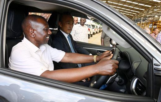 President William Ruto driving a vehicle