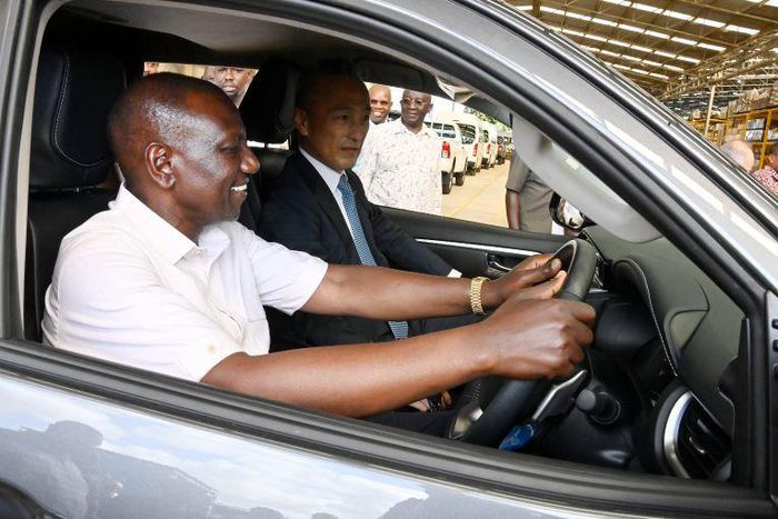 President William Ruto driving a vehicle