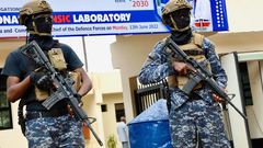 Officers from the Anti-terror Police Unit stand guard at the DCI National Forensic Lab