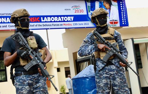 Officers from the Anti-terror Police Unit stand guard at the DCI National Forensic Lab