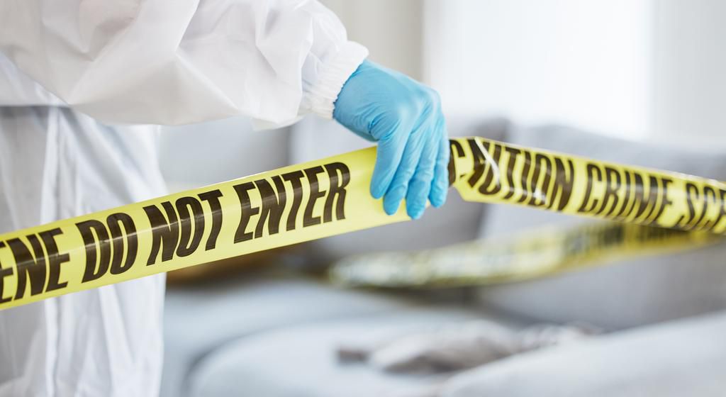 A stock image shows an investigator at a crime sceneJacob Wackerhausen/Getty Images