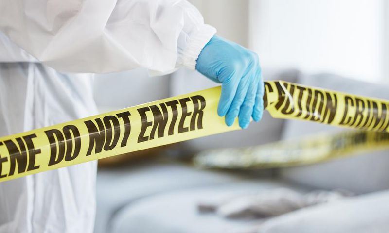 A stock image shows an investigator at a crime sceneJacob Wackerhausen/Getty Images