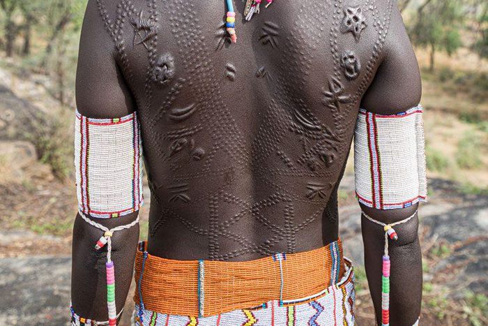 Larim woman with her scars [Lastplaces]