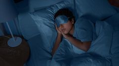 A person asleep in bed [Photo: Ground Picture]