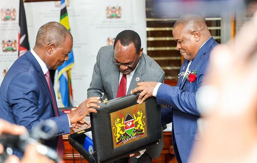 Treasury CS Njuguna Ndung'u with PS Chris Kiptoo having a look at Kenya's budget briefcase