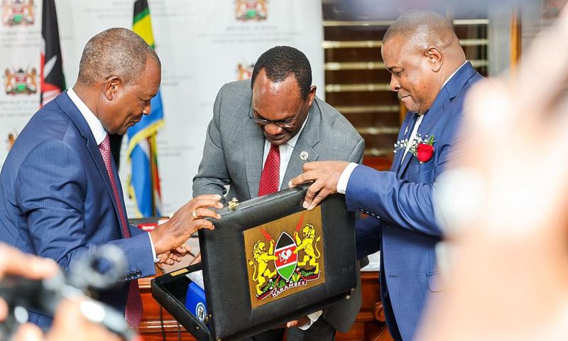 Treasury CS Njuguna Ndung'u with PS Chris Kiptoo having a look at Kenya's budget briefcase