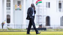 President William Ruto taking a phone call at State House, Nairobi