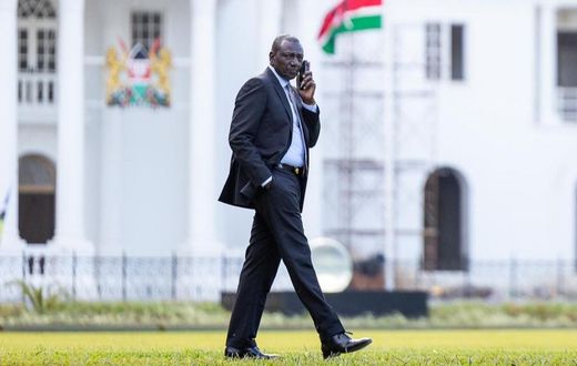 President William Ruto taking a phone call at State House, Nairobi
