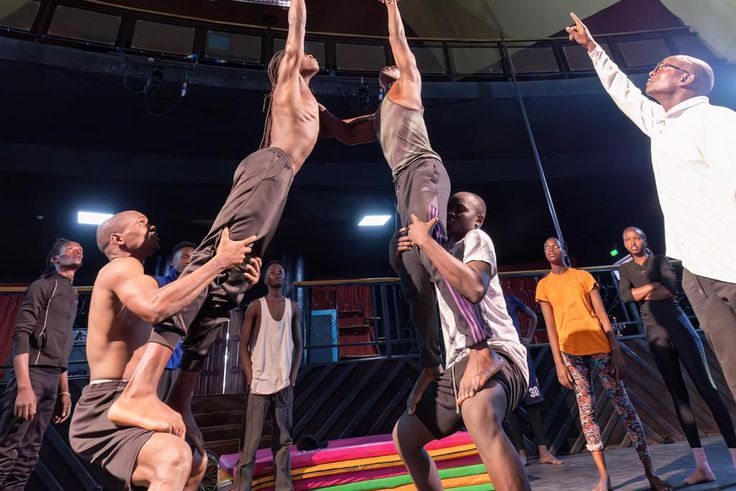 Watchful eyes of Acrobat Coach, Mr Mathias Kavita, as his team dazzles with their breathtaking skills.