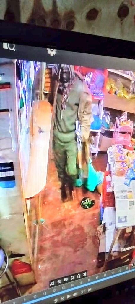 CCTV footage captured a rogue police officer robbing PEPS Mini Supermarket in Kisii