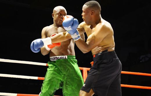 Karim Mandonga in action against Daniel Wanyonyi at the KICC
