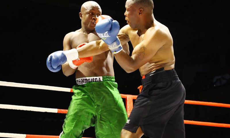 Karim Mandonga in action against Daniel Wanyonyi at the KICC