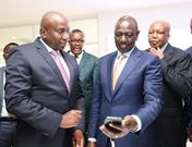 President William Ruto is shown a smart phones made at the East Africa Device Assembly Kenya factory in Athi River, Machakos during its launch on October 30, 2023.