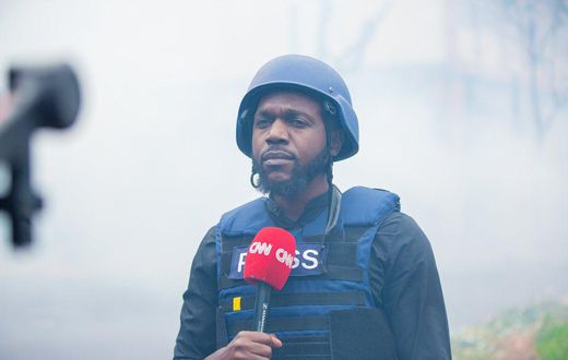 Larry Madowo reporting during the anti-Finance Bill protests