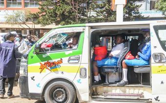 Students going to school in a Matatu