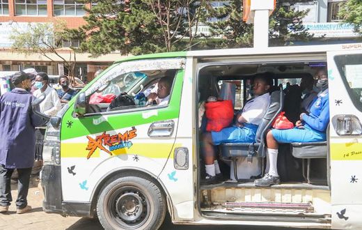 Students going to school in a Matatu
