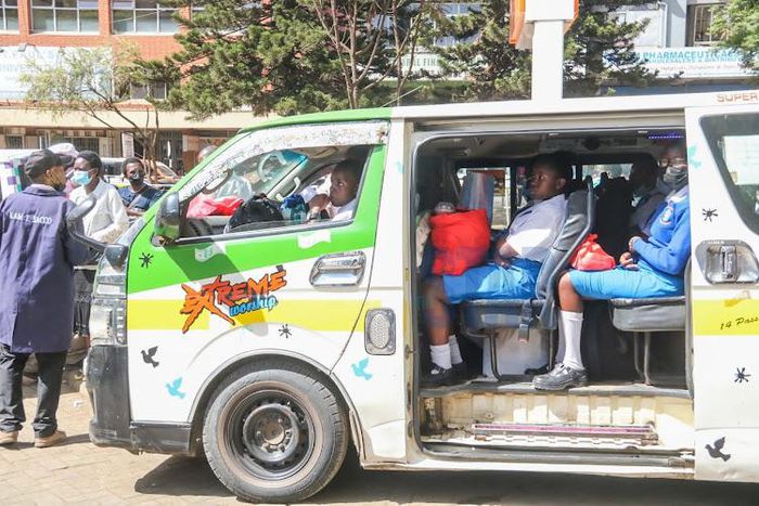 Students going to school in a Matatu
