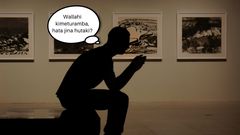 Silhouette of a man thinking hard.