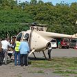 NRT Kenya's chopper, a Hughes 369FF (530MG), evacuating a woman in Isiolo county