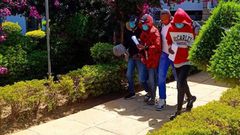 Acquitted suspects in the killing of fashion designer Edwin Chiloba being led out of court