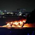 This photo provided by Jiji Press shows a Japan Airlines plane on fire on a runway of Tokyo's Haneda Airport on January 2, 2024.STR/JIJI PRESS/AFP via Getty Images
