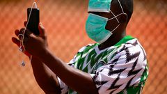 Nigeria mask phone coronavirus