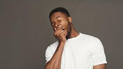 A man yawning