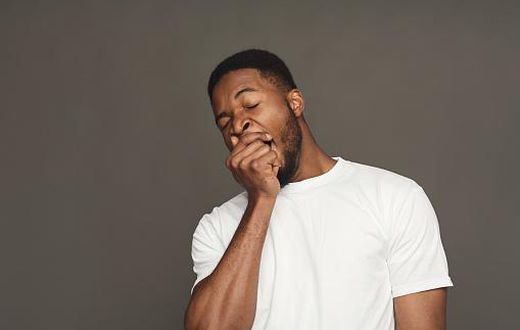 A man yawning