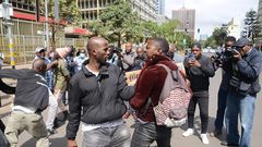 An undercover police officer arrests an activist within the Nairobi's Central Business District (CBD) during a demonstration against the Financial Bill 2023. Photo by John Ochieng