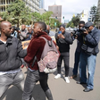 An undercover police officer arrests an activist within the Nairobi's Central Business District (CBD) during a demonstration against the Financial Bill 2023. Photo by John Ochieng
