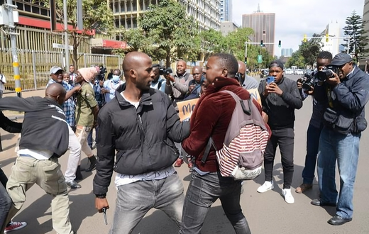 An undercover police officer arrests an activist within the Nairobi's Central Business District (CBD) during a demonstration against the Financial Bill 2023. Photo by John Ochieng