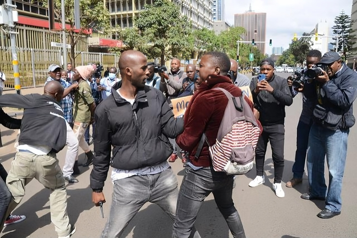 An undercover police officer arrests an activist within the Nairobi's Central Business District (CBD) during a demonstration against the Financial Bill 2023. Photo by John Ochieng
