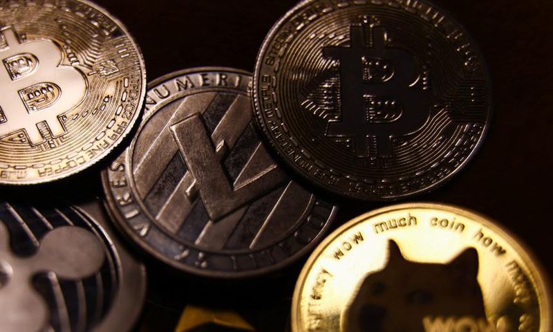 A representation of cryptocurrencies including bitcoin and dogecoin are seen in this illustration photo.Jakub Porzycki/NurPhoto via Getty Images