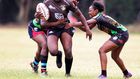 Mwamba's Terry Ayesa (centre) gain grounds from Top Fry Nakuru's Freshia Awino (left) and Yvonne Motari during the Kenya Cup Women's league match played at Impala Club on November 27, 2021. Photo/CHRIS OMOLLO